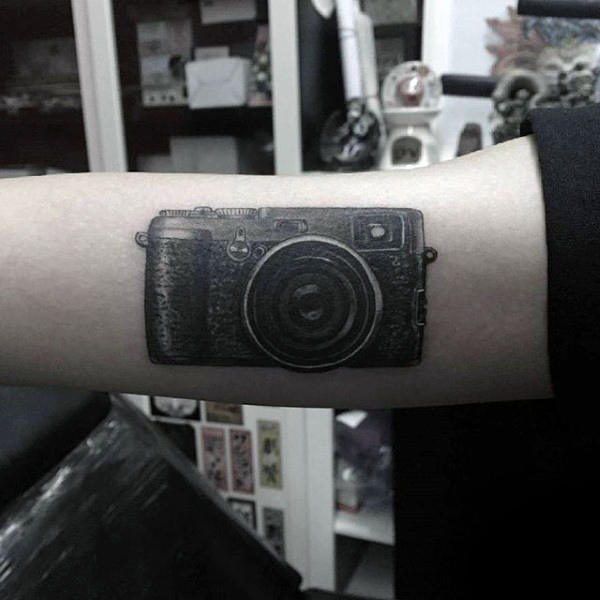 tatuaje camara fotografica 89