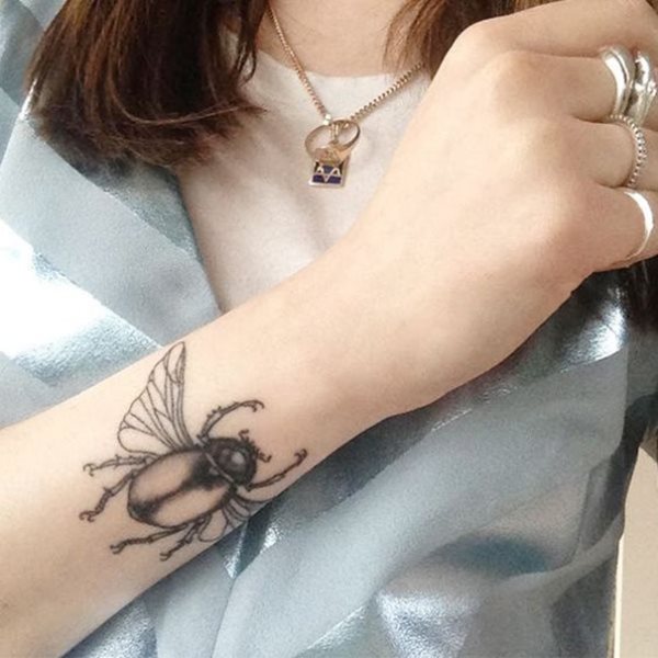 tatuaje escarabajo 82