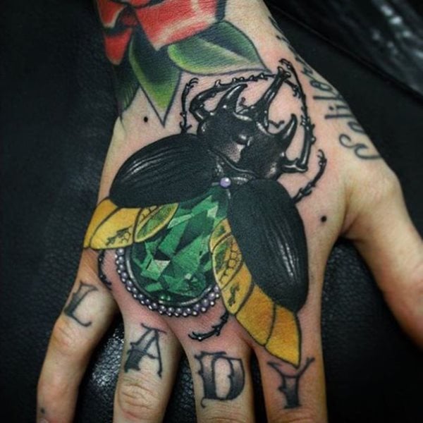 tatuaje escarabajo 88