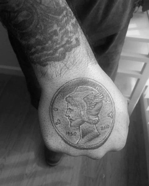 tatuaje moneda 61
