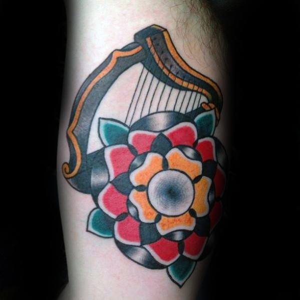 tatuaje harpa 107