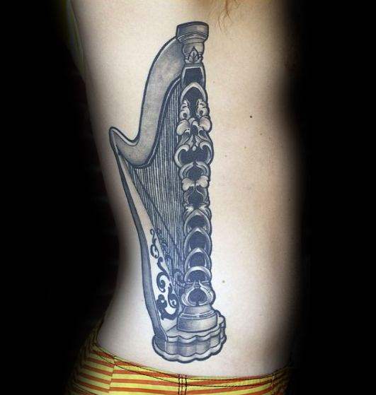 tatuaje harpa 35