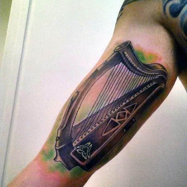 tatuaje harpa 68