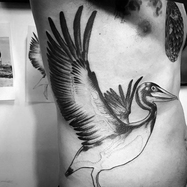 tatuaje pelicano 82
