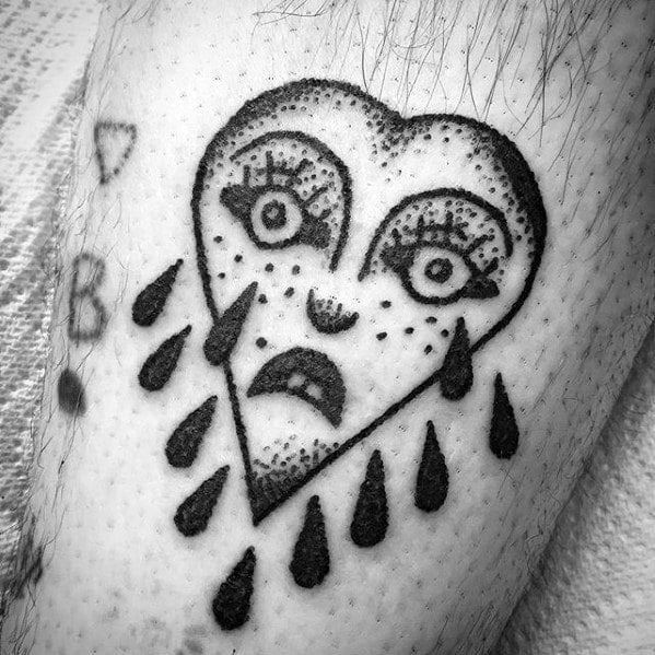 tatuaje corazon llorando 44