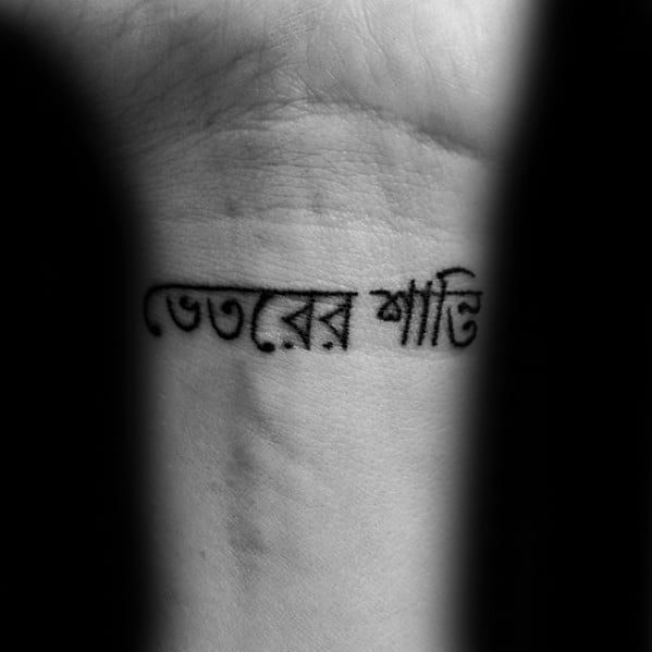 tatuaje en sanscrito 102