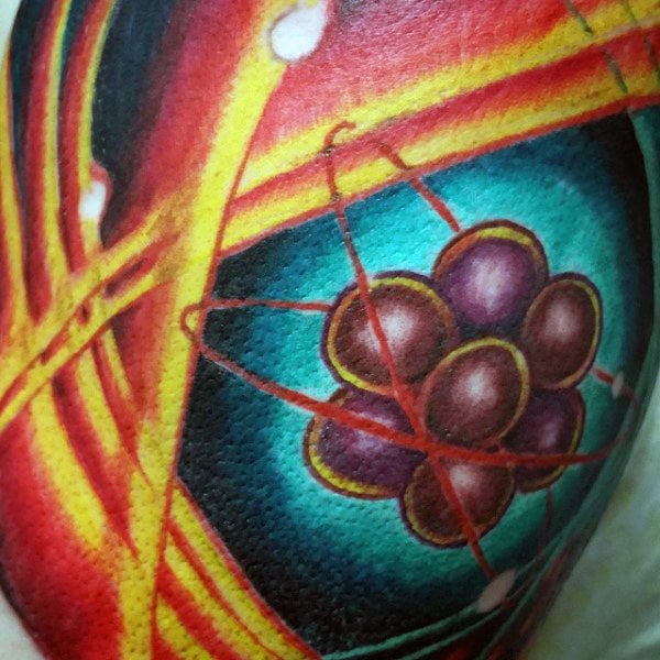 tatuaje atomo 13