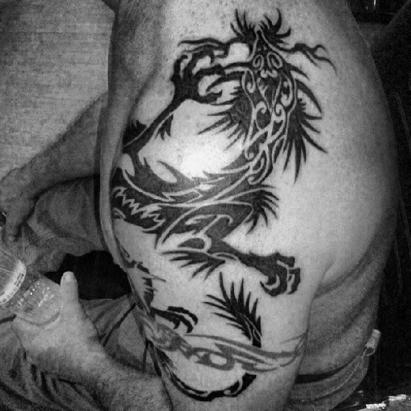 tatuaje dragon tribal 101