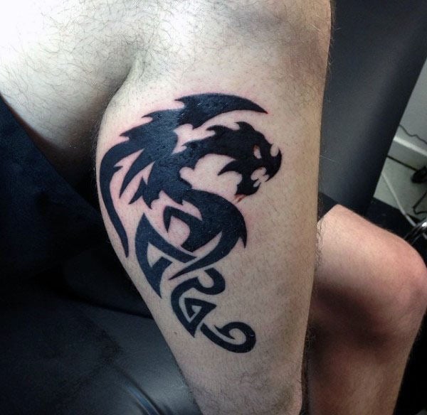 tatuaje dragon tribal 69