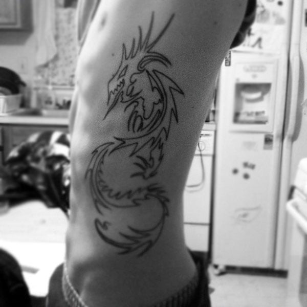 tatuaje dragon tribal 89