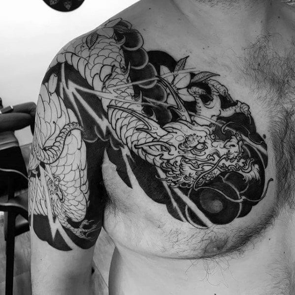tatuaje dragon hombro 32