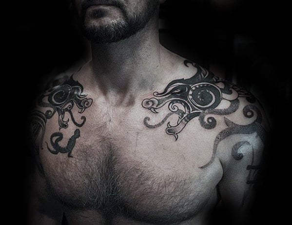 tatuaje dragon hombro 50