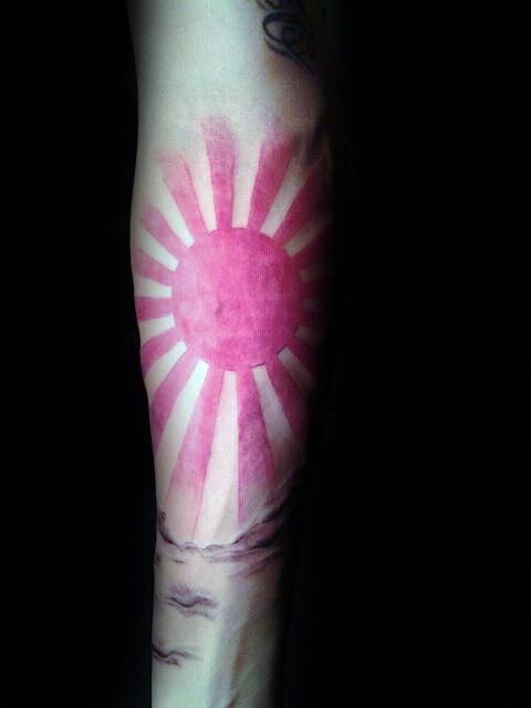 tatuaje sol naciente 34