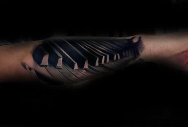 tatuaje piano teclado 105