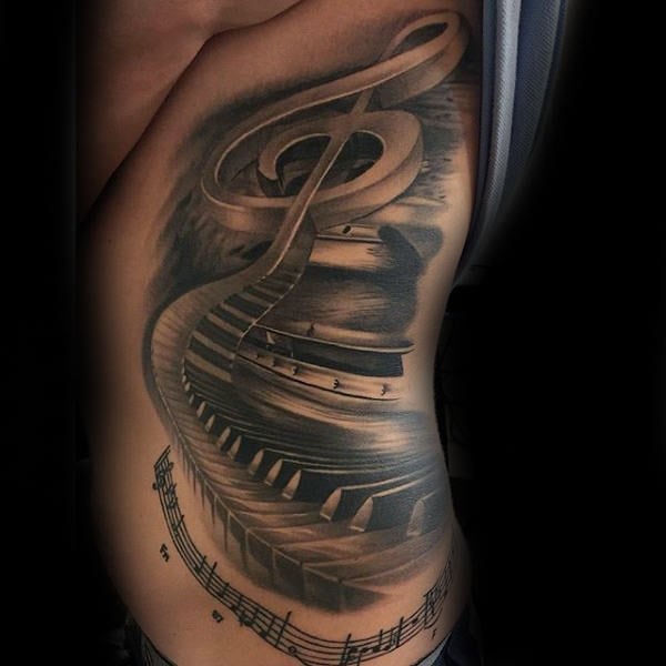 tatuaje piano teclado 21