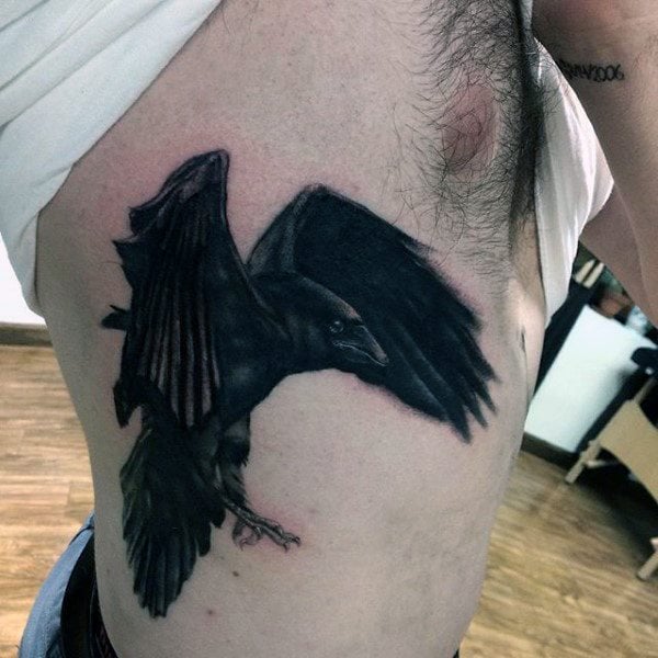 tatuaje cuervo negro para hombre 32