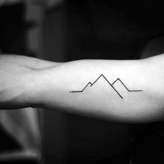 tatuaje minimalista montana para hombre 40