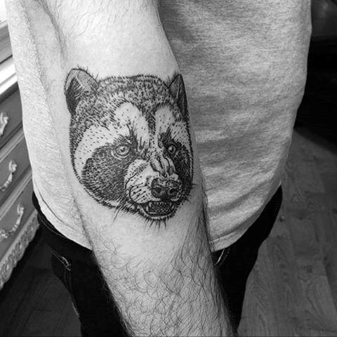 tatuaje mapache 125