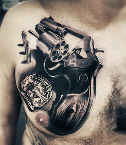 tatuaje pistola hombre 81