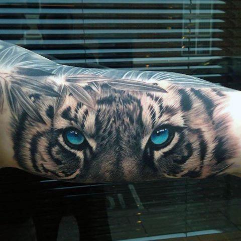 tatuaje ojos de tigre 33