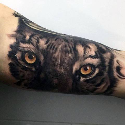 tatuaje ojos de tigre 37