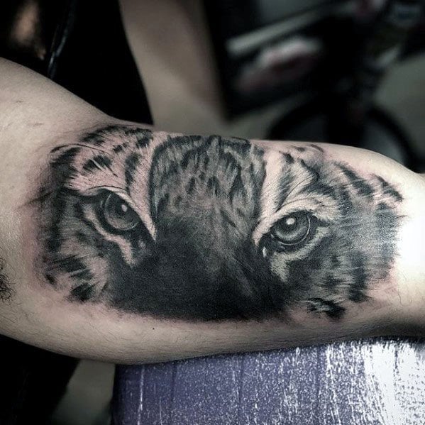 tatuaje ojos de tigre 47