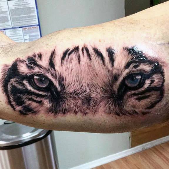 tatuaje ojos de tigre 55