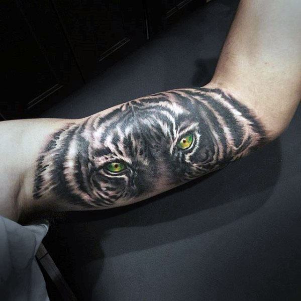 tatuaje ojos de tigre 59