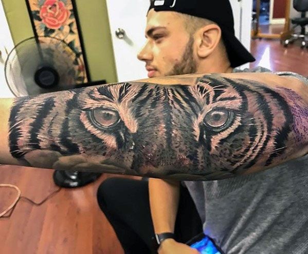 tatuaje ojos de tigre 71