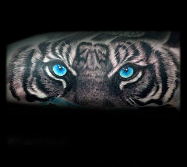 tatuaje ojos de tigre 73
