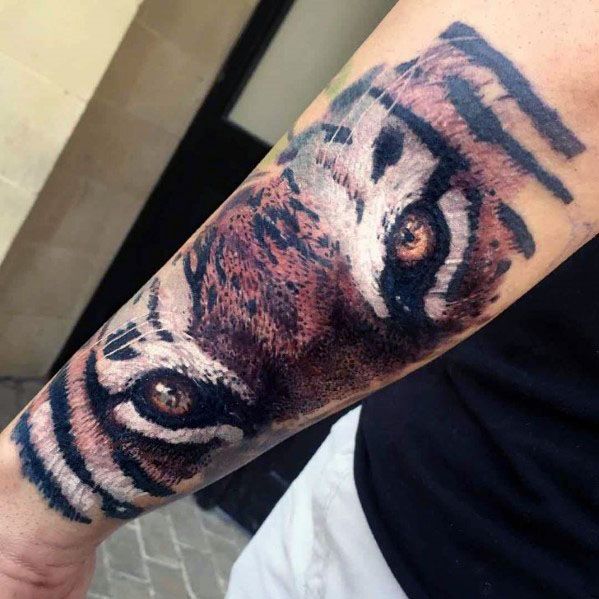 tatuaje ojos de tigre 75