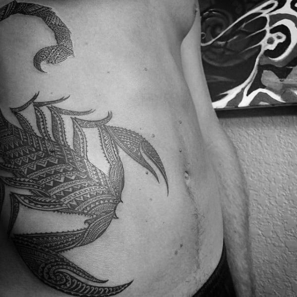 tatuaje escorpion tribal 45