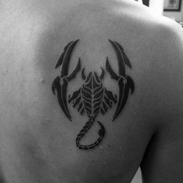 tatuaje escorpion tribal 69