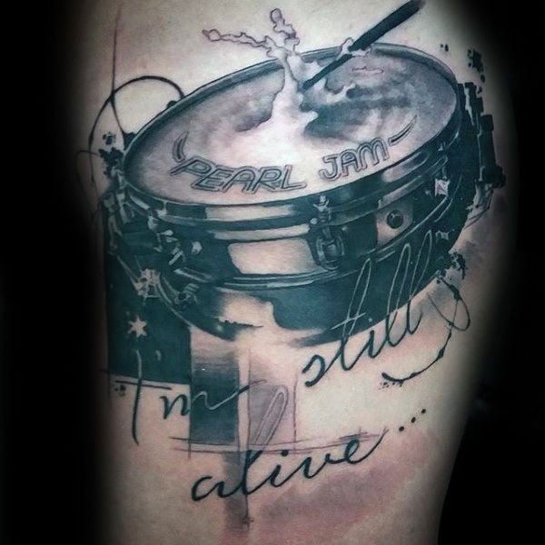 tatuaje bateria tambor 111