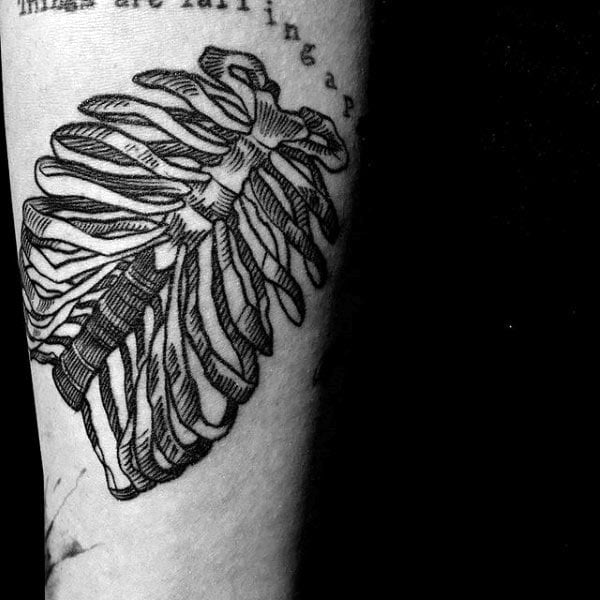 tatuaje huesos 186