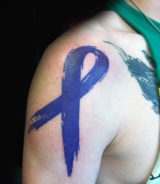 tatuaje lazo contra cancer 147