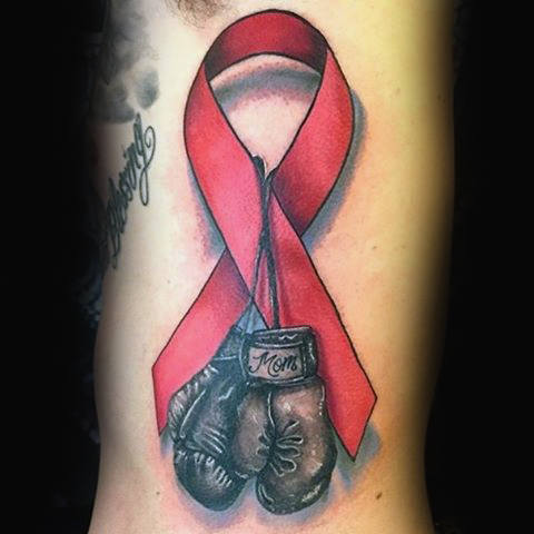 tatuaje lazo contra cancer 21