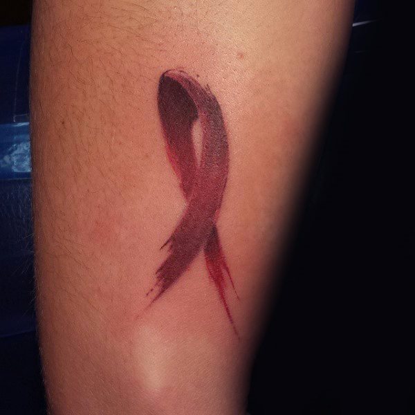 tatuaje lazo contra cancer 72
