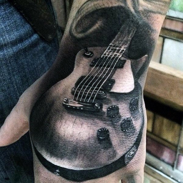 tatuaje guitarra 151
