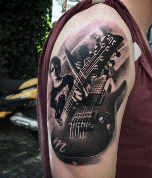 tatuaje guitarra 31