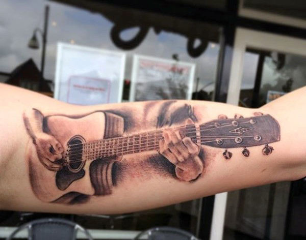 tatuaje guitarra 76