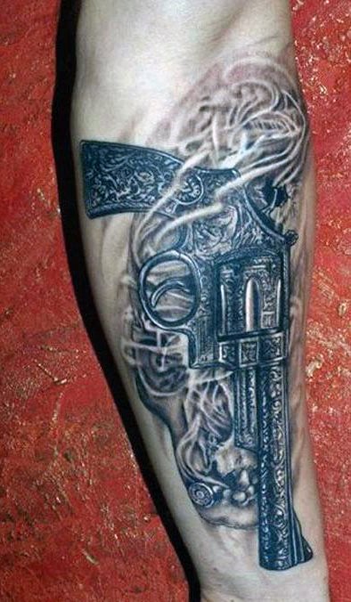 tatuaje pistola 34