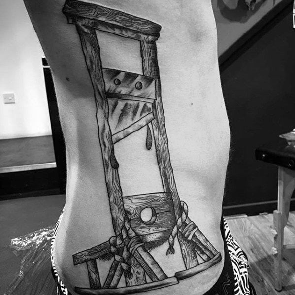 tatuaje guillotina 35