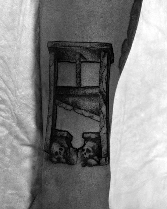 tatuaje guillotina 93
