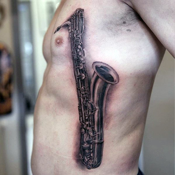 tatuaje saxofon 32