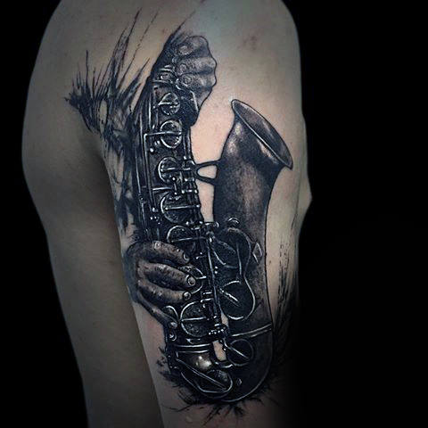 tatuaje saxofon 84