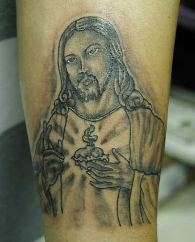 tatuaje religioso 7779