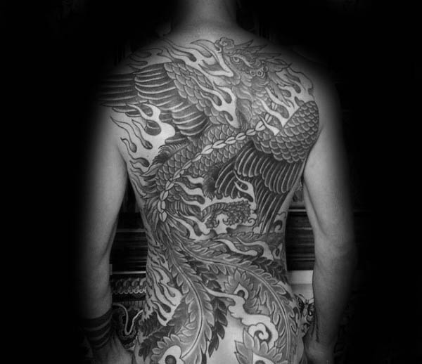 tatuaje fenix en espalda 37