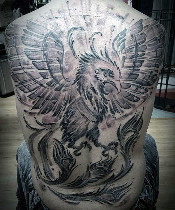 tatuaje fenix en espalda 53