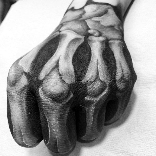 tatuaje hueso esqueleto mano 69